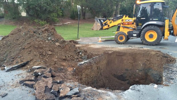 A sinkhole opened up at the intersection of Tarcoola Avenue and Tarnook Drive, Ferny Hills, on Saturday afternoon.