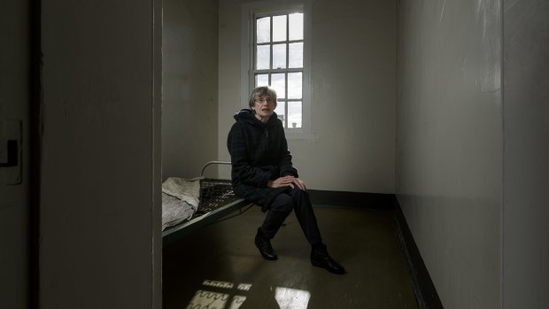 Barbara Burton in one of the rooms for paying female patients. 