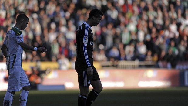 Walk of shame: Ronaldo was sent off for lashing out during Real's win over Cordoba.