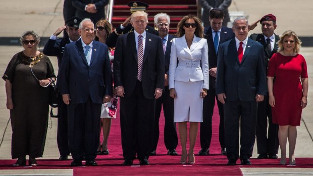 President Donald Trump and his wife Melania Trump standing with Israeli Prime Minister Benjamin Netanyahu and his wife Sara (right) and Israeli President Reuven Rivlin and his wife Nehama at Ben Gurion International Airport.