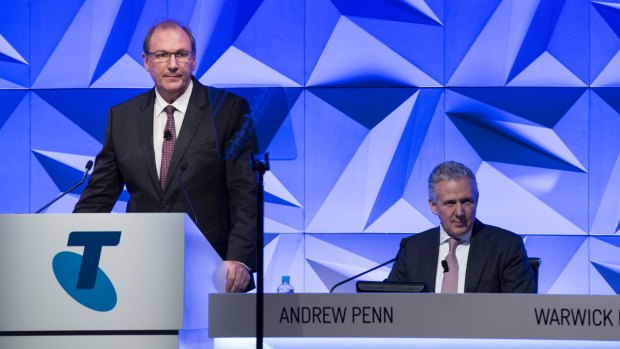 Telstra chairman John Mullen (left) flagged the dividend cut.