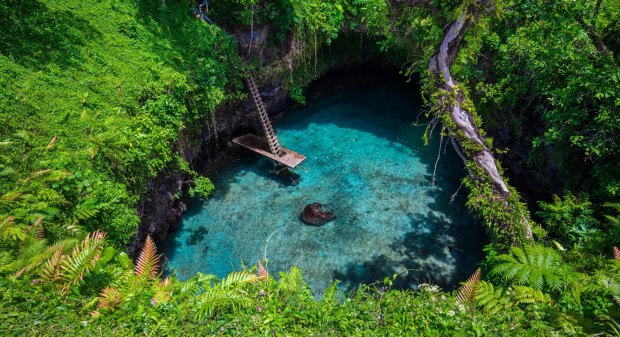 To Sua ocean trench, a famous swimming hole in Samoa, South Pacific.