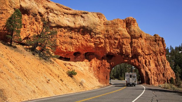 A truck-camper passes through a small tunnel along Highway 12 Scenic Byway in Red Canyon, Utah. Highway 12 runs from its junction with Highway 89 near Panguitch to the town of Torrey, Utah.
sunapr7utahÂ Scenic Byway 12 Utah USA ; text by Rob McFarland ; SUPPLIED via journalist ; filename/credit:Â Tunnel in Red Canyon on Scenic Byway 12_Steve Greenwood.jpg
