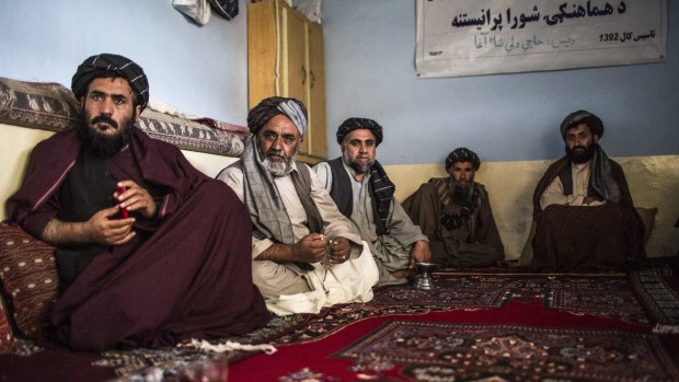 Tribal elders hearing a case in Kandahar in December. Afghanistan’s informal justice system also includes Taliban courts. 