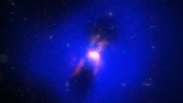Powerful jets from the black hole inflate huge "bubbles" in the hot gas surrounding the galaxy.