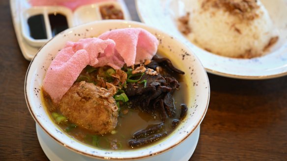 Soto padang - spicy beef broth with vermicelli, beef jerky and potato.