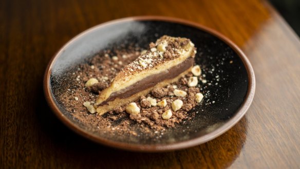 The Ferrero Rocher pie comes with toasted hazelnuts and chocolate soil.