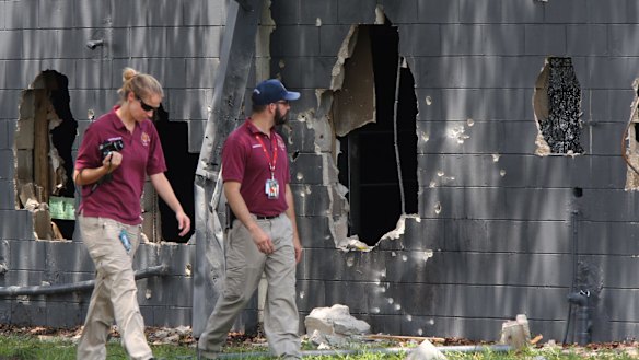 Investigators from the office of the medical examiner at Pulse nightclub where a gunman opened fire on Sunday.