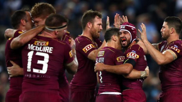 All square: Queensland celebrate after the final whistle.