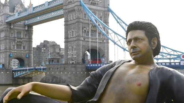 A 25ft statue of actor Jeff Goldblum's in a pose from a scene in the first Jurassic Park movie, which has been created by a TV channel to celebrate the film's 25th birthday, at Potters Fields Park, London.
