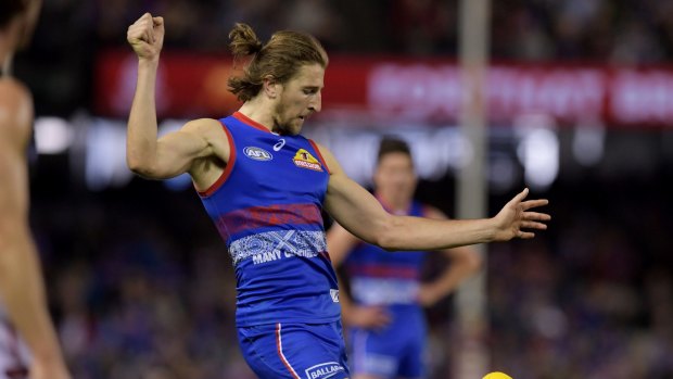 Marcus Bontempelli kicks a crucial late goal against the Bombers, one of the Bulldogs' best wins of the season. 