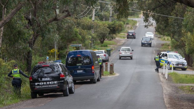 Police search the streets near Elisa Curry's house at Aireys Inlet on October 5.