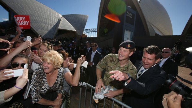 Prince Harry and NSW Premier Mike Baird greet crowds at the Opera House.