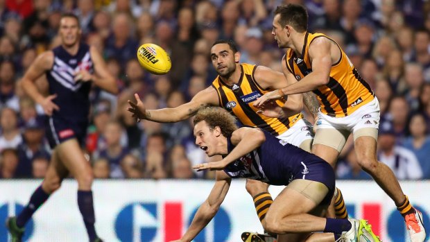 No break needed: Shaun Burgoyne in the thick of the action during the preliminary final against Fremantle.