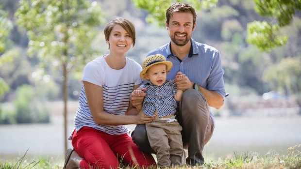 Belconnen couple Rebecca Stones and Adam Duffy with their 14-month-old son Henry. The couple are engaged but will not marry until same sex marriage is legalised. 