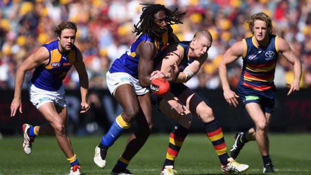 Battle of the ruckmen: Nic Naitanui of the Eagles competes for the ball against Sam Jacobs of the Crows.