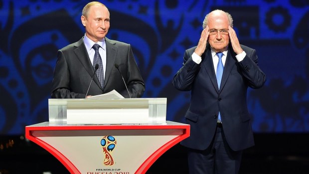 Old pals: Vladimir Putin lavished praise on embattled FIFA boss Sepp Blatter.