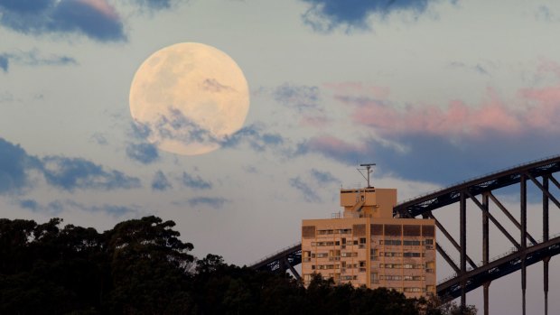 A supermoon rises over Sydney Harbour in August 2014.