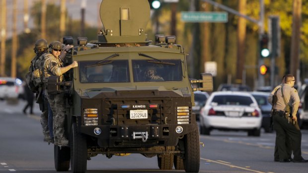 Police hunt for the killers following the shootings in San Bernardino in December.