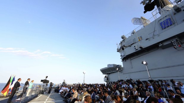 The Italian aircraft carrier Giuseppe Garibaldi is co-ordinating the EU's migrant rescue operation in the Mediterranean.