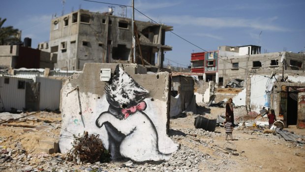 A mural of a playful-looking kitten, presumably painted by British street artist Banksy, in Beit Hanoun.