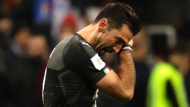 Italy goalkeeper Gianluigi Buffon cries after his team got eliminated.