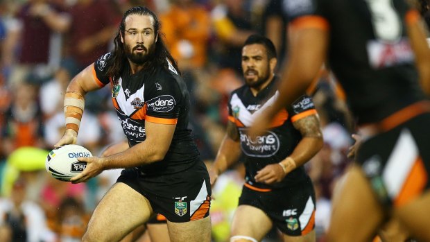 Bold approach: Tigers captain Aaron Woods looks to make a pass during the round two NRL match on Monday in which they defeated the Sea Eagles.