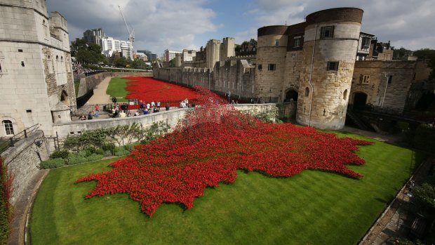 'Blood Swept Lands and Seas of Red' by Paul Cummins, made up of 888,246 ceramic poppies, at the Tower of London.