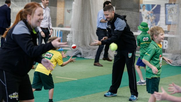 Giving back: Michael Clarke at the SCG on Thursday coaching kids how to play cricket.