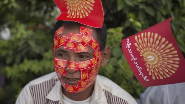 A supporter of Aung San Suu Kyi's National Development Party (NDP) in Mandalay on Sunday.