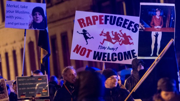  Supporters of  right-wing populist group Pegida march on the first anniversary of its Leipzig affiliate, called Legida, this month  in Leipzig, Germany. Pegida and other right-wing activists have been quick to latch on to the New Year's Eve sex attacks in Cologne. 