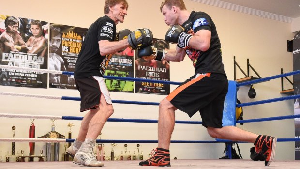 Jeff Horn (right) trains with Glenn Ruston during a training session in Brisbane, on Monday, June 26, 2017.