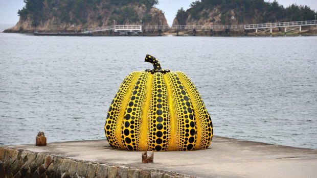 The Yellow Pumpkin, an installation art by Yayoi Kusama is displayed at Naoshima Island in Japan.