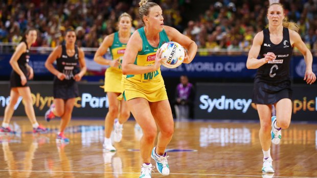 Fired up: Kimberlee Green passes during Australia's pool game loss to New Zealand