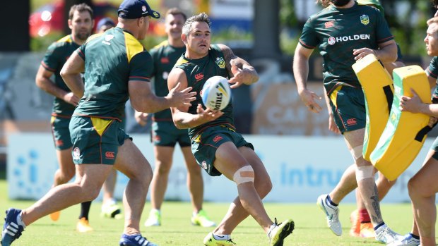 Gearing up for game day: Kangaroos forward Corey Parker passes the ball during training for Friday's Anzac Test in Brisbane.