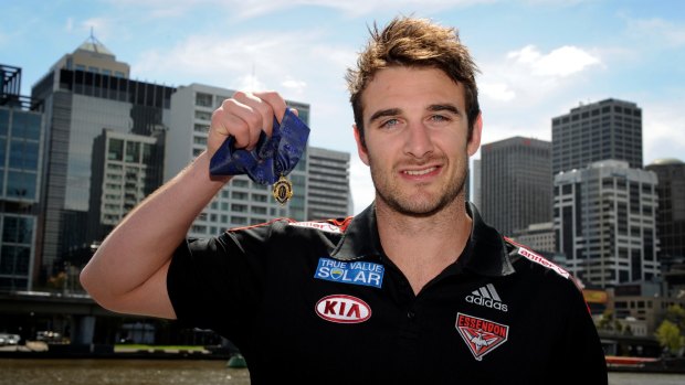 Jobe Watson with his Brownlow Medal in 2012.