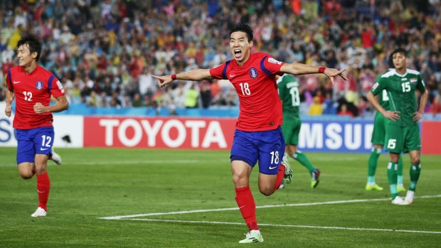 South Korea's Lee Jeonghyeop celebrates after putting his team ahead during the Asian Cup semi-final against Iraq on Monday.