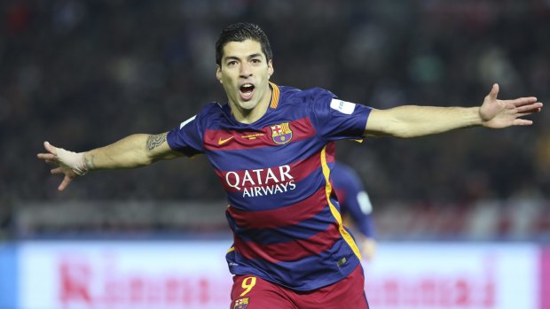 Yet another trophy: Luis Suarez celebrates one of his two goals in the final.