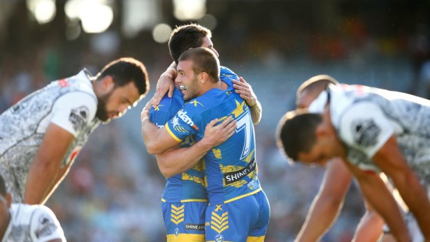 Big win: The Eels celebrate after their Auckland Nines triumph. 