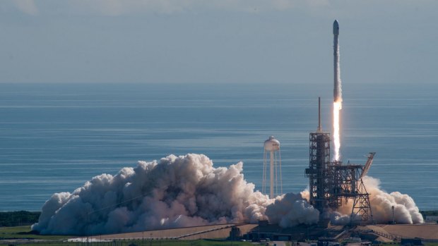 A SpaceX Falcon 9 rocket lifts off with the Pentagon's test vehicle attached.