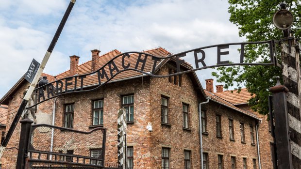 The entrance gate to former concentration and extermination camp Auschwitz-Birkenau.