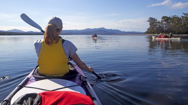 Still waters: Kayakers in Port Davey.