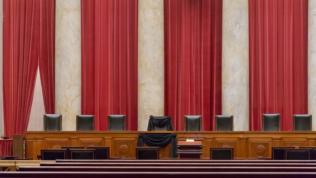 Supreme Court Justice Antonin Scalia's courtroom chair is draped in black to mark his death as part of a tradition that dates to the 19th century.