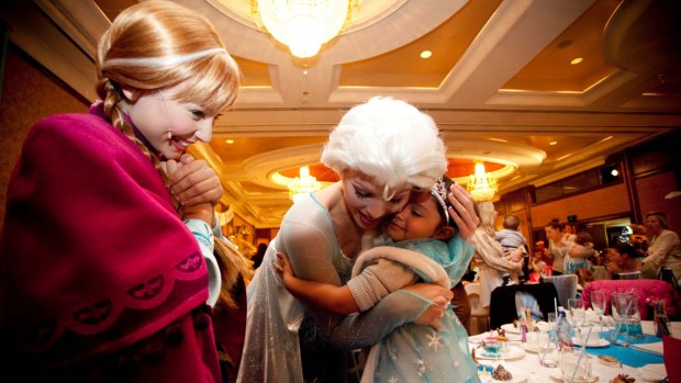 Three-year-old Samara Muir, who was racially vilified at a Disney <i>Frozen</i> event in May, attends a Melbourne high tea to meet the Norwegian sisters she adores, 'Anna' and 'Elsa'.