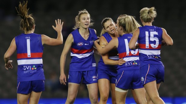 The success of the Western Bulldogs' clash with Melbourne last year has helped provide the impetus for a new AFL women's league - but could they ever line up in a mixed team?