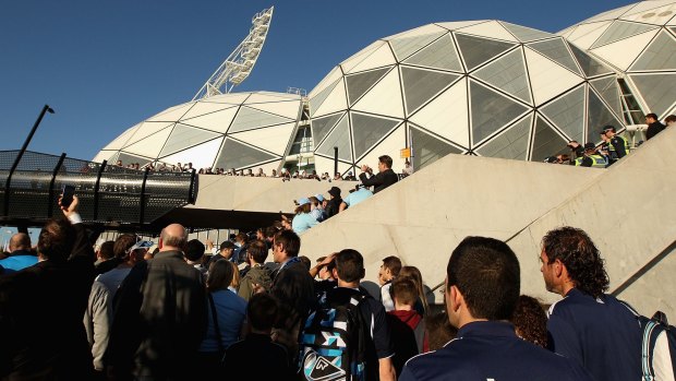 Fans arrive to attend the A-League grand final.