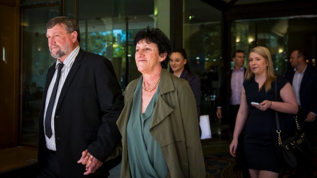 Ordeal: Phillip Hughes' parents, Greg and Virginia Hughes, leave the inquest on Wednesday.