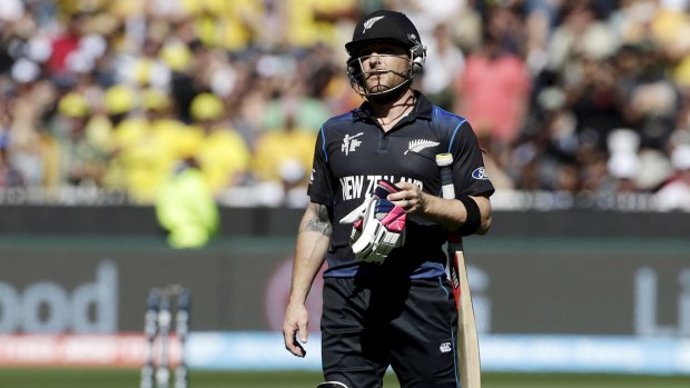 Disappointing end: New Zealand captain Brendon McCullum walks off the field after being bowled for a duck by Australia's Mitchell Starc in the World Cup final.