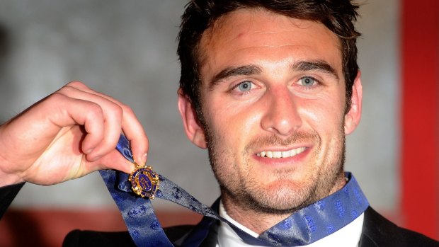 Banned Essendon player Jobe Watson with his 2012 Brownlow Medal.