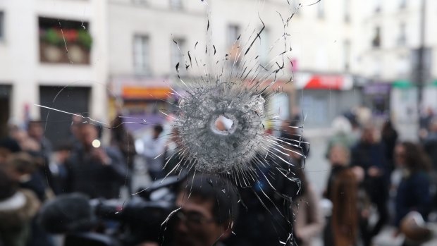 Bullet holes adjacent to the La Belle Equipe cafe.